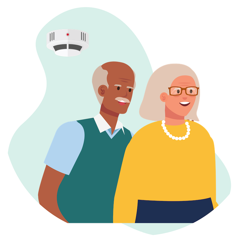 elderly couple with a carbon monoxide detector